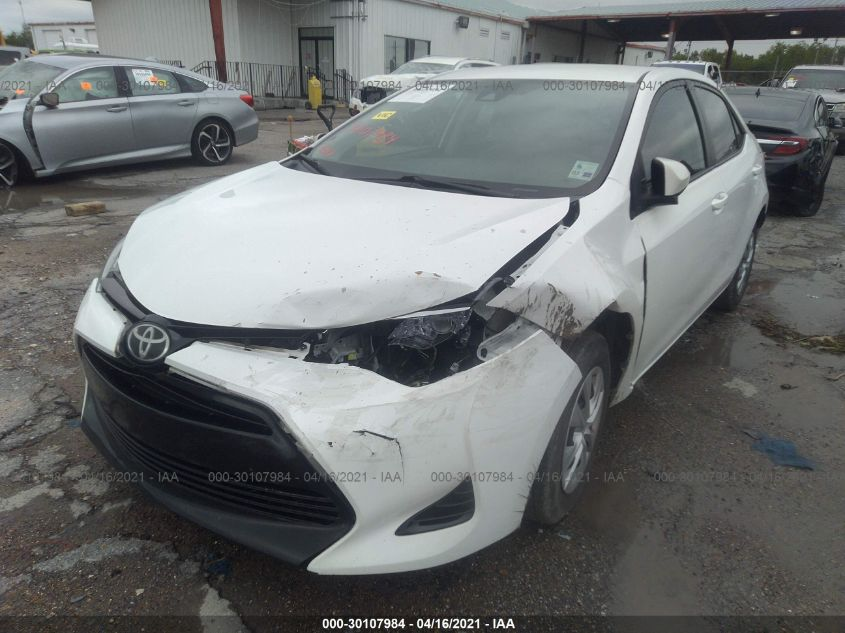 VIN: 5YFBURHEXHP598729 | TOYOTA COROLLA 2017 L/LE/XLE/SE White 1.8